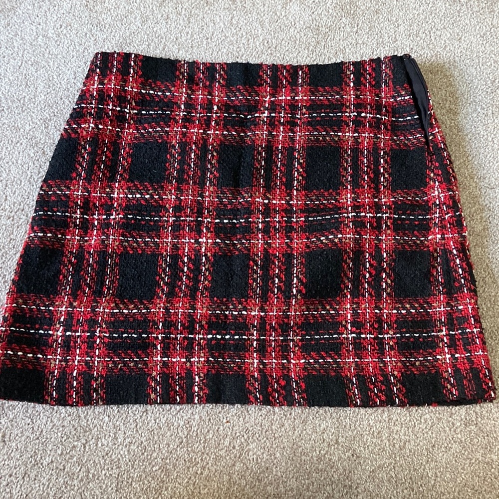 Red and black plaid Loft skirt.